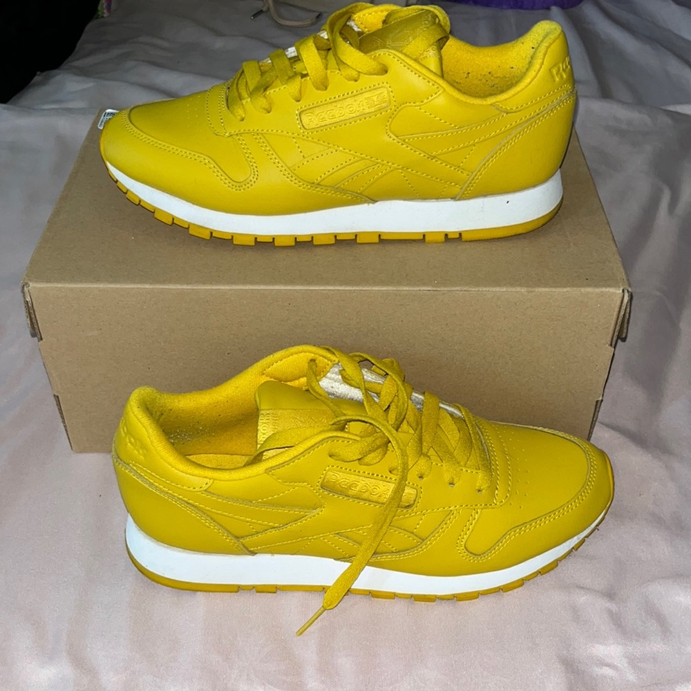 Yellow reebok sneakers